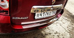 Накладка бампера декор. RENAULT Duster, штамп 'DUSTER' 2011-> нерж. сталь  nbi025 Dollex
